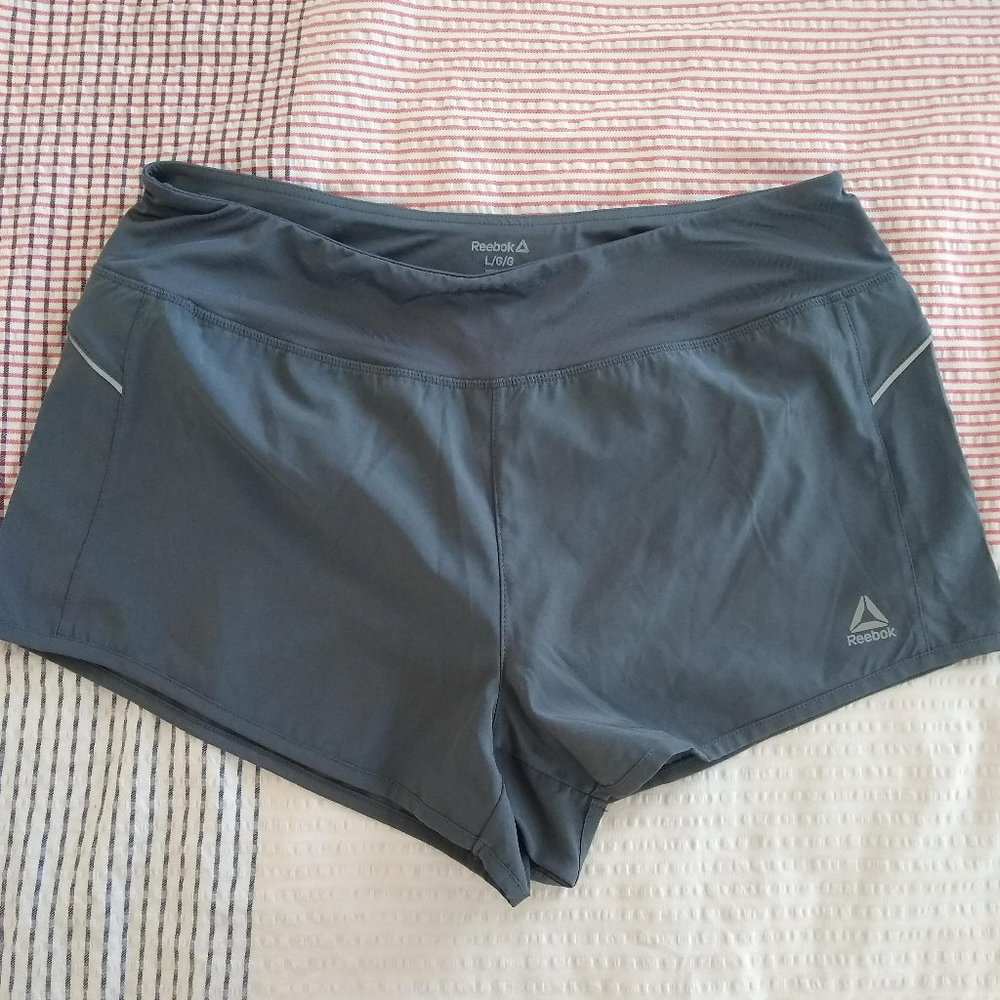 NWOT grey Reebok athletic shorts, size L